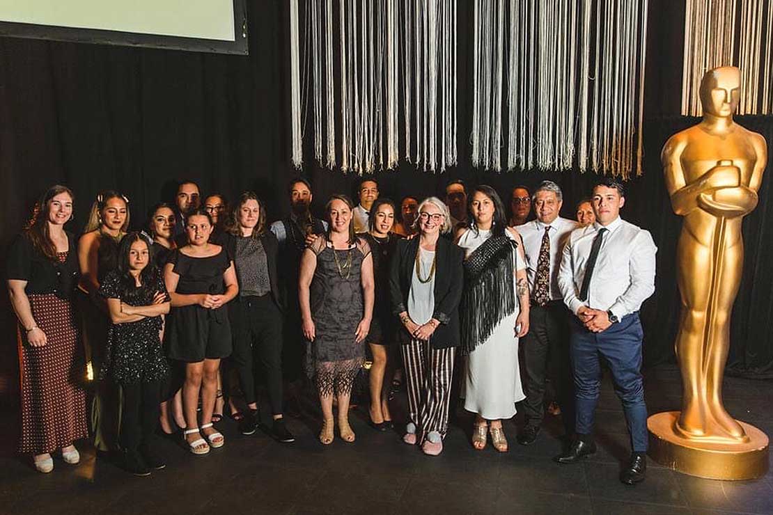 From left to right: Front row:  Jade Fiso, Miah Fiso, Katie Monteith, Serena Fiso, Estelle Fiso, Pro Vice-Chancellor Professor Claire Robinson, Monique Fiso, Siuai Fiso, Elijah Fiso.  Back row:  Emma Wright, Shannah Fiso, Te Ruinga Diamond, Tauke King, Sunnie Kershaw, Maaka Fiso, Clayton Marino, Jontelle Marino, Luke Fiso, Natasha Timoteo, Eleni Fiso.